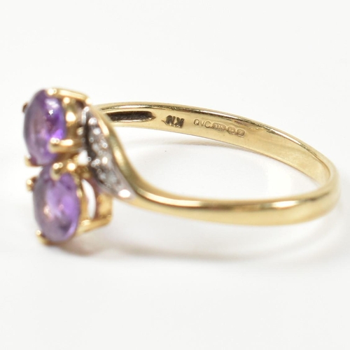 302 - A hallmarked 9ct gold, amethyst and diamond cross over ring. The ring having two round cut amethysts... 