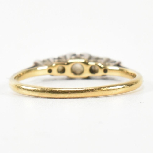 303 - An 18ct gold and diamond five stone ring. The ring having a row of five graduating round cut diamond... 