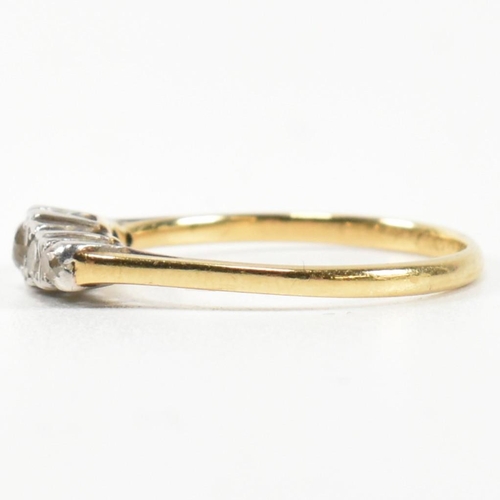 303 - An 18ct gold and diamond five stone ring. The ring having a row of five graduating round cut diamond... 