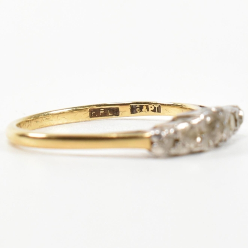 303 - An 18ct gold and diamond five stone ring. The ring having a row of five graduating round cut diamond... 