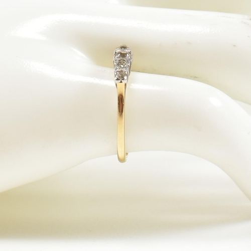 303 - An 18ct gold and diamond five stone ring. The ring having a row of five graduating round cut diamond... 