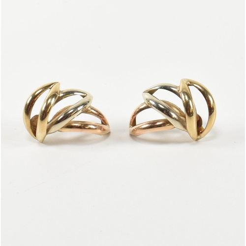 307 - A pair of hallmarked 9ct gold three tone wreath earrings. The stud earrings having a laurel wreath d... 