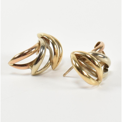 307 - A pair of hallmarked 9ct gold three tone wreath earrings. The stud earrings having a laurel wreath d... 