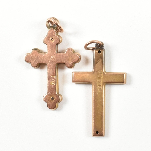 315 - Two 9ct gold cross necklace pendants. The lot to include two 9ct gold cross pendants both with folia... 