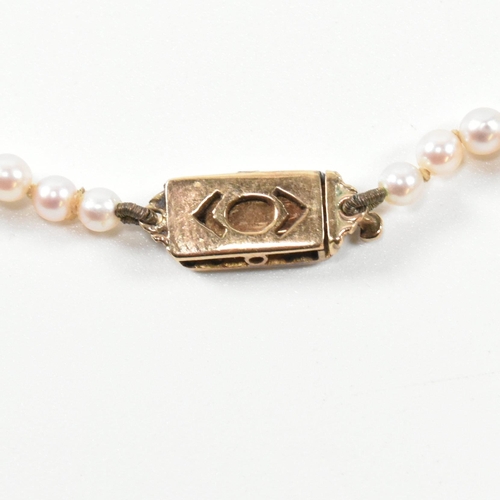 317 - A 9ct gold, cultured pearl and diamond necklace. The necklace having a single row of graduated cultu... 