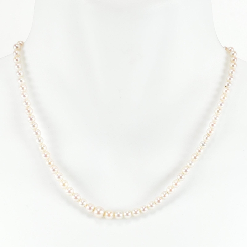 317 - A 9ct gold, cultured pearl and diamond necklace. The necklace having a single row of graduated cultu... 