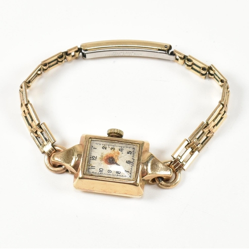 319 - A hallmarked 9ct gold Audax ladies dress watch with rolled gold bracelet strap. The watch dial havin... 