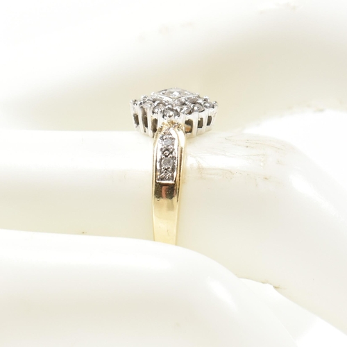 324 - A hallmarked 9ct gold and diamond cluster ring. The ring having a central round brilliant cut diamon... 