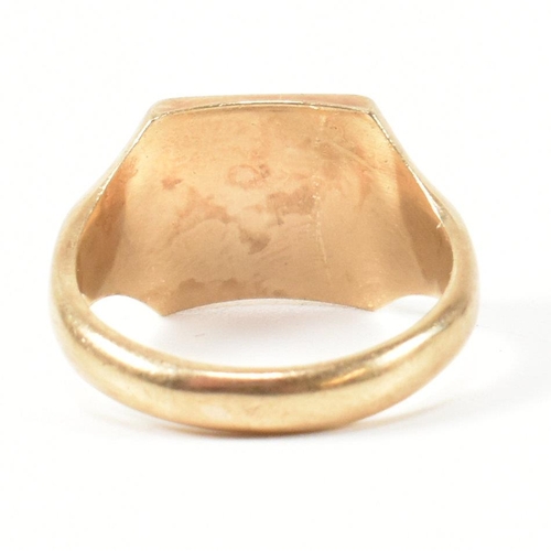 327 - A hallmarked 9ct gold signet ring. The 9ct gold signet ring having a square face with vertical chevr... 