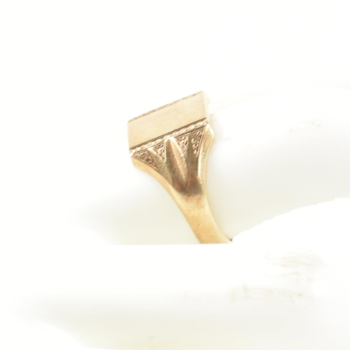 327 - A hallmarked 9ct gold signet ring. The 9ct gold signet ring having a square face with vertical chevr... 