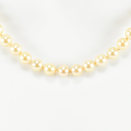 331 - 14ct white gold and cultured pearl necklace. The necklace strung with a single row of cultured pearl... 