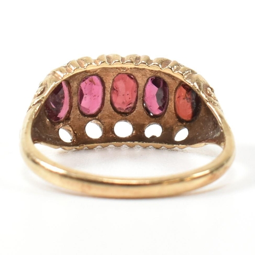 332 - A hallmarked 9ct gold and garnet five stone half hoop ring. The 9ct gold ring having five oval cut g... 