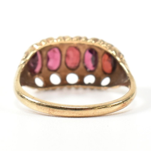 332 - A hallmarked 9ct gold and garnet five stone half hoop ring. The 9ct gold ring having five oval cut g... 