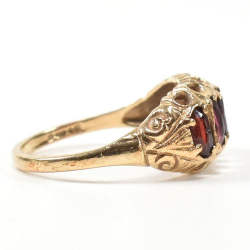 332 - A hallmarked 9ct gold and garnet five stone half hoop ring. The 9ct gold ring having five oval cut g... 