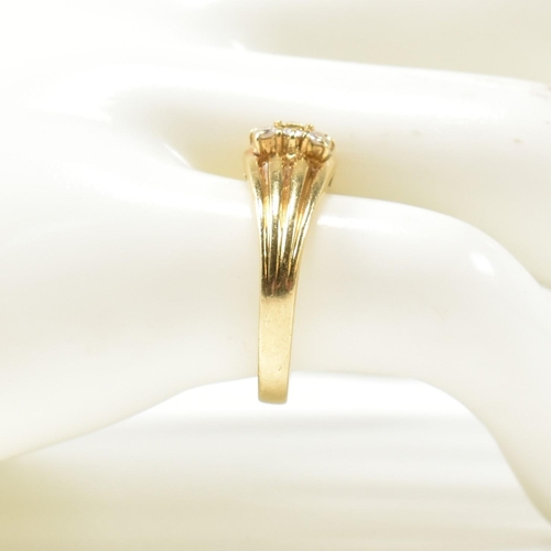 333 - A hallmarked 18ct gold and diamond signet ring. The ring having a central round cut diamond surround... 