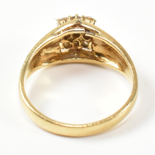 333 - A hallmarked 18ct gold and diamond signet ring. The ring having a central round cut diamond surround... 