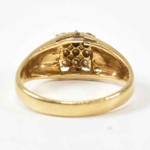 333 - A hallmarked 18ct gold and diamond signet ring. The ring having a central round cut diamond surround... 