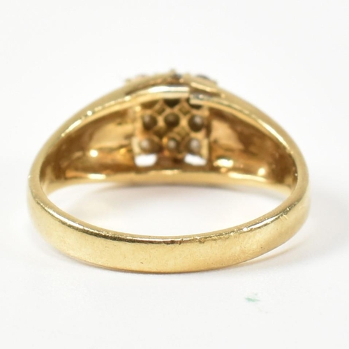 333 - A hallmarked 18ct gold and diamond signet ring. The ring having a central round cut diamond surround... 