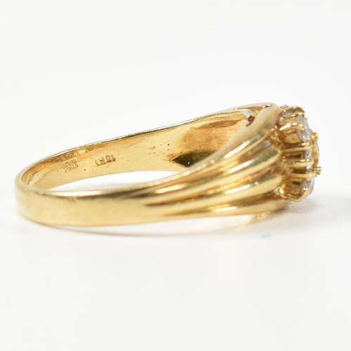 333 - A hallmarked 18ct gold and diamond signet ring. The ring having a central round cut diamond surround... 