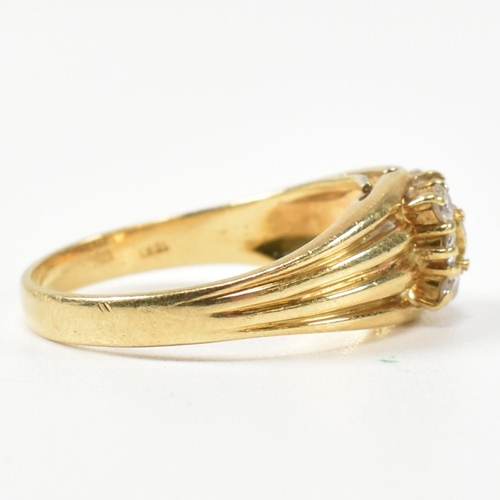 333 - A hallmarked 18ct gold and diamond signet ring. The ring having a central round cut diamond surround... 