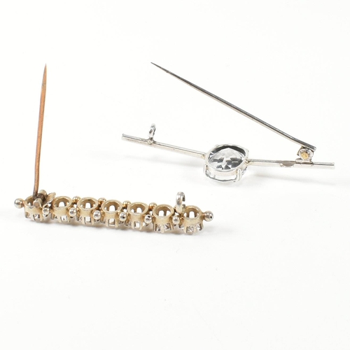 334 - Two white stone set brooch pins. The brooches to include a silver bar brooch set with a double claw ... 