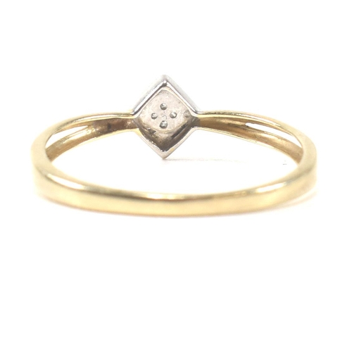 336 - A 9ct gold and diamond cluster ring. The ring having a 9ct white gold rhombus shape mount set with p... 