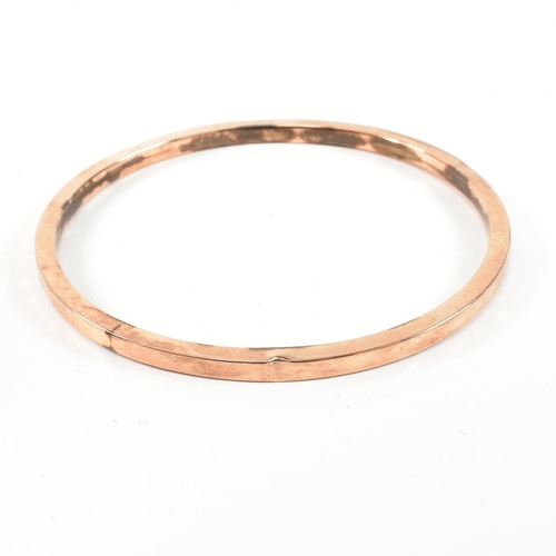 339 - A hallmarked 9ct rose gold bangle bracelet. The flat 9ct rose gold bangle, hallmarked for Birmingham... 