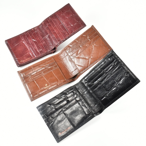 341 - Three Mulberry card wallets. The lot to include a Mulberry 10 card ID wallet in Bordeaux reptile pri... 