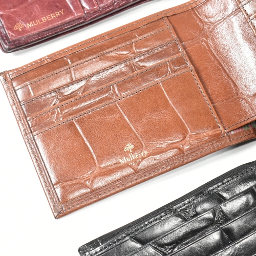 341 - Three Mulberry card wallets. The lot to include a Mulberry 10 card ID wallet in Bordeaux reptile pri... 