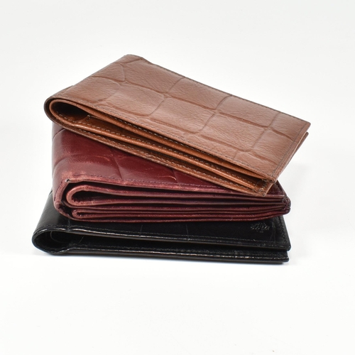 341 - Three Mulberry card wallets. The lot to include a Mulberry 10 card ID wallet in Bordeaux reptile pri... 