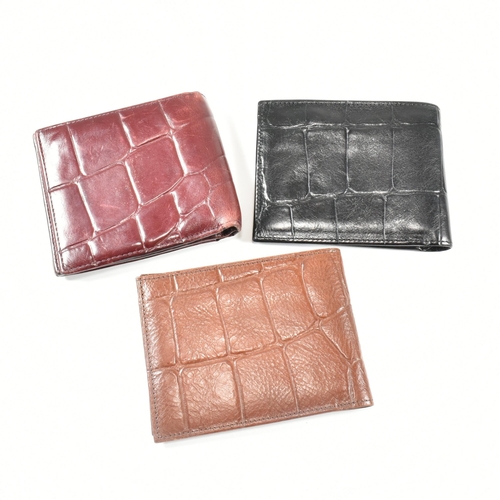 341 - Three Mulberry card wallets. The lot to include a Mulberry 10 card ID wallet in Bordeaux reptile pri... 