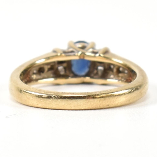 351 - A hallmarked 9ct gold, sapphire and diamond ring. The 9ct gold ring having a central trellis set ova... 