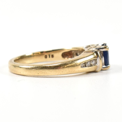 351 - A hallmarked 9ct gold, sapphire and diamond ring. The 9ct gold ring having a central trellis set ova... 