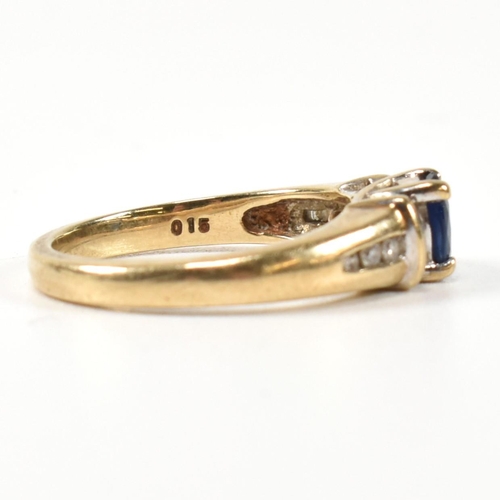 351 - A hallmarked 9ct gold, sapphire and diamond ring. The 9ct gold ring having a central trellis set ova... 