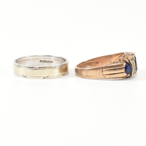 355 - Two hallmarked 9ct gold and gem set rings. The rings to include a hallmarked 9ct gold, synthetic sap... 