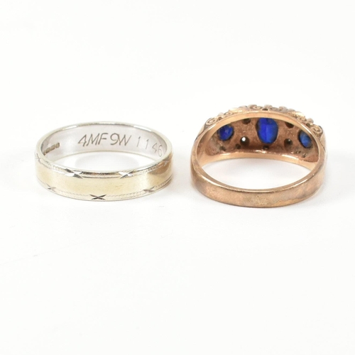 355 - Two hallmarked 9ct gold and gem set rings. The rings to include a hallmarked 9ct gold, synthetic sap... 