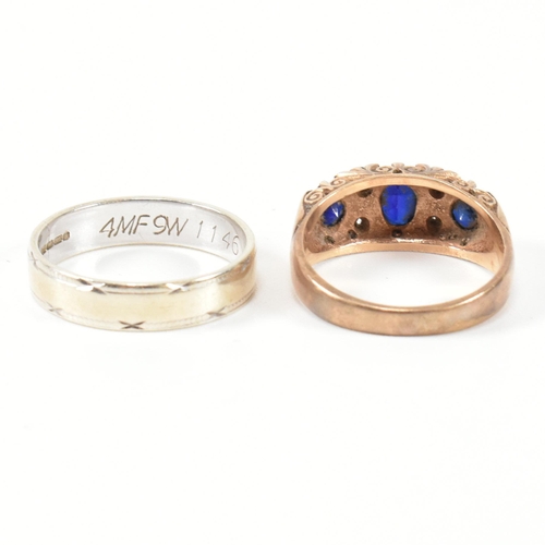 355 - Two hallmarked 9ct gold and gem set rings. The rings to include a hallmarked 9ct gold, synthetic sap... 