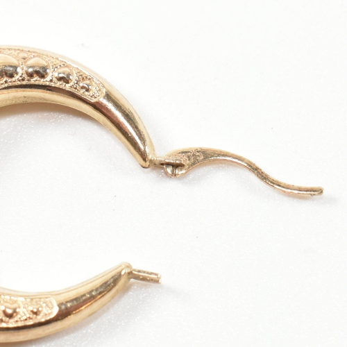 358 - Two pairs of 9ct gold hoop earrings. The earrings to include a pair of hallmarked 9ct gold twisted t... 