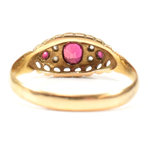 36 - An Edwardian hallmarked 18ct gold ruby and diamond ring. The ring set with a central oval cut ruby f... 