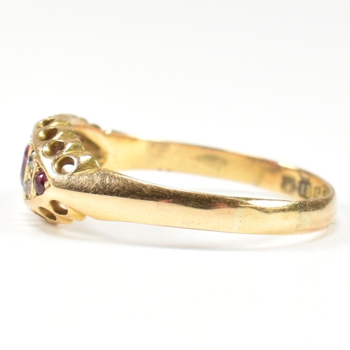 36 - An Edwardian hallmarked 18ct gold ruby and diamond ring. The ring set with a central oval cut ruby f... 