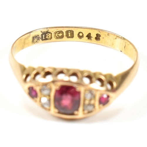 36 - An Edwardian hallmarked 18ct gold ruby and diamond ring. The ring set with a central oval cut ruby f... 