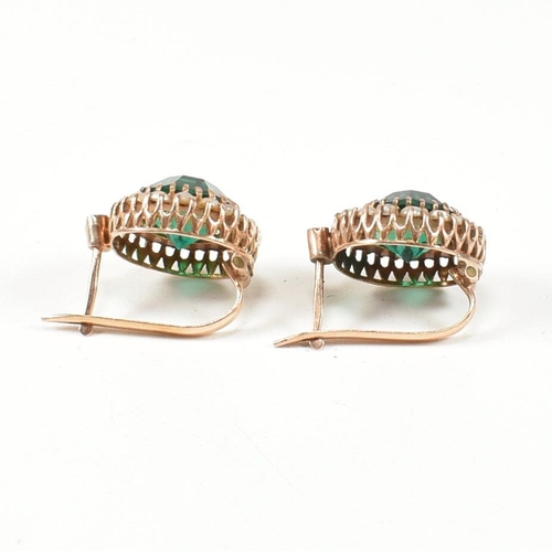 364 - A pair of 14ct gold, pearl and green paste earrings. The drop earrings having a central round cut gr... 