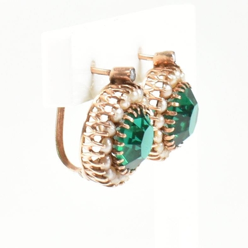 364 - A pair of 14ct gold, pearl and green paste earrings. The drop earrings having a central round cut gr... 