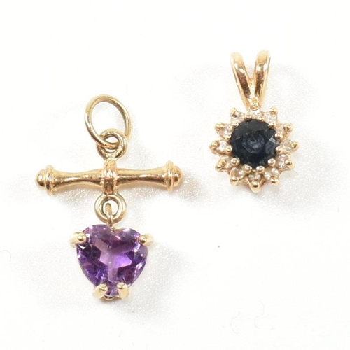 368 - Two gold and gem set necklace pendants. The necklace pendants to include a gold pendant with a heart... 