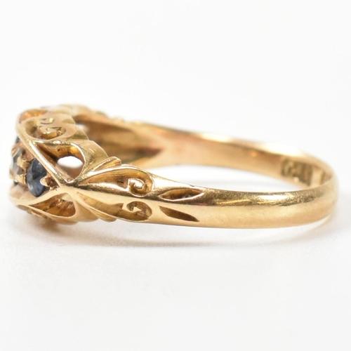 369 - An Edwardian hallmarked 18ct gold, sapphire and diamond boat ring. The ring set with a central oval ... 