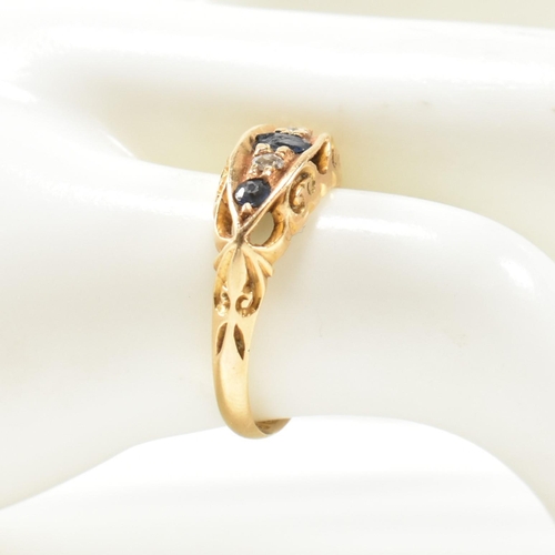 369 - An Edwardian hallmarked 18ct gold, sapphire and diamond boat ring. The ring set with a central oval ... 