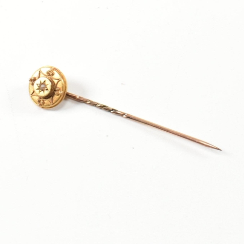 37 - A 19th century 15ct gold and gem set brooch pin and stick pin. The lot to include a 15ct gold bar br... 