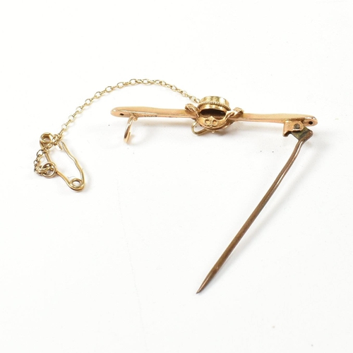 37 - A 19th century 15ct gold and gem set brooch pin and stick pin. The lot to include a 15ct gold bar br... 