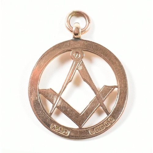 371 - A hallmarked 9ct gold Masonic fob pendant. The 9ct gold pierced fob medal having a bright cut engrav... 