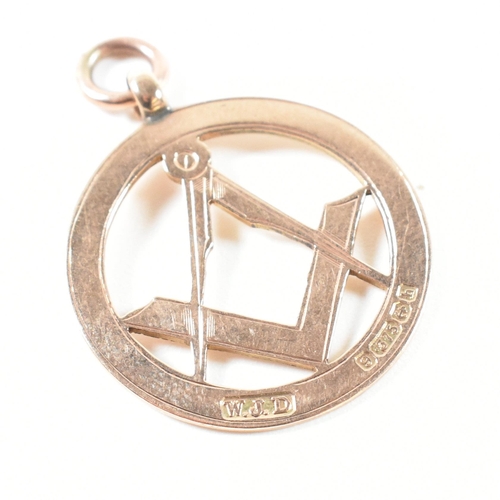 371 - A hallmarked 9ct gold Masonic fob pendant. The 9ct gold pierced fob medal having a bright cut engrav... 